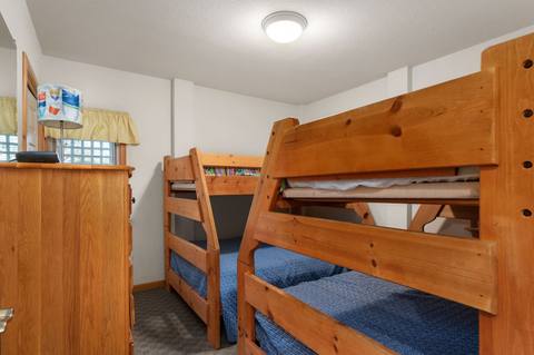 Bedroom 2 on the bottom level, furnished as a bunk room