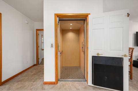 Elevator landing on the bottom level, next to the game room