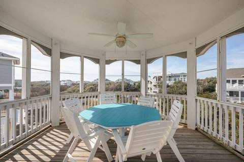 Screened gazebo porch off the top level, furnished for sitting outdoors bug-free